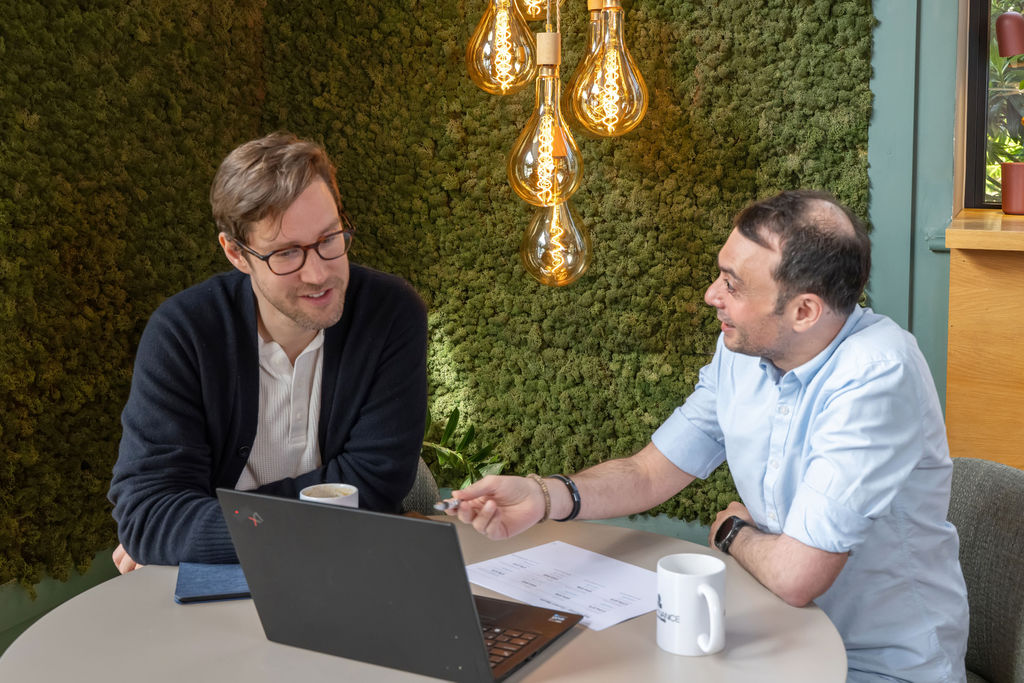 Marco Scaramuzzino, fractional CFO, meeting agency client to discuss financial performance and strategy