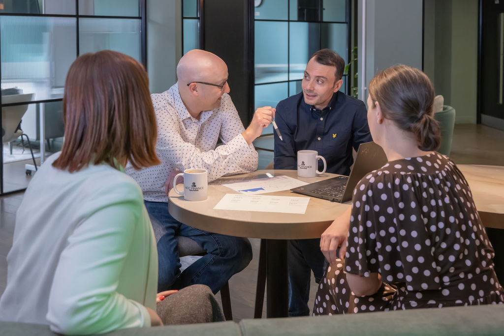 Fractional CFO team meeting to review agency finances, business growth plans, and financial strategy